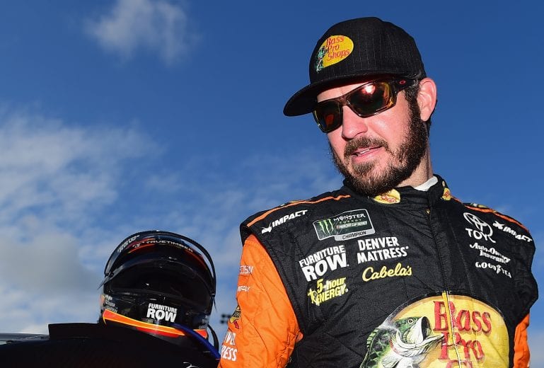 HOMESTEAD, FL - NOVEMBER 18: Martin Truex Jr., driver of the #78 Bass Pro Shops/5-hour ENERGY Toyota, takes part in pre-race ceremonies for the Monster Energy NASCAR Cup Series Ford EcoBoost 400 at Homestead-Miami Speedway on November 18, 2018 in Homestead, Florida. (Photo by Jared C. Tilton/Getty Images) | Getty Images