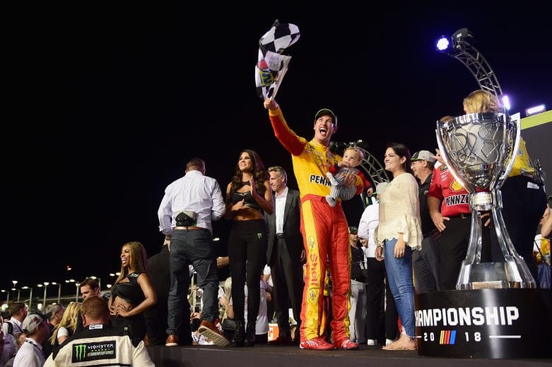Joey Logano celebrating