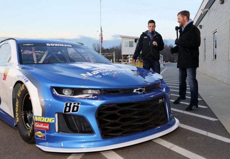 MOORESVILLE, NC - DECEMBER 06: (L-R) Alex Bowman and Dale Earnhardt Jr. discuss the #88 car during the Nationwide 2019 Paint Scheme Reveal at GoPro Motorplex on December 6, 2018 in Mooresville, North Carolina. (Photo by Streeter Lecka/Getty Images) | Getty Images