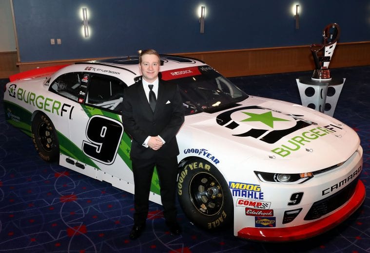 CHARLOTTE, NC - DECEMBER 08:  2018 NASCAR Xfinity Series Champion, Tyler Reddick, poses for a photograph during the NASCAR XFINITY and Truck Series Banquets at Charlotte Convention Center on December 8, 2018 in Charlotte, North Carolina.  (Photo by Streeter Lecka/Getty Images) | Getty Images