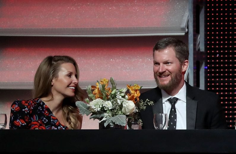 CHARLOTTE, NC - DECEMBER 08:  Dale Earnhardt Jr. sits alongside his wife Amy during the NASCAR XFINITY and Truck Series Banquets at Charlotte Convention Center on December 8, 2018 in Charlotte, North Carolina.  (Photo by Streeter Lecka/Getty Images) | Getty Images