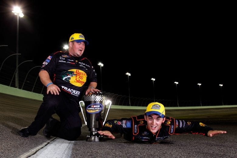 HOMESTEAD, FL - NOVEMBER 18: Crew cheif Danny Stockman, Jr. and Austin Dillon, driver of the #3 Bass Pro Shops/Tracker Chevrolet pose with the championship trophy after winning the 2011 Series Championship in the NASCAR Camping World Truck Series Ford 200 at Homestead-Miami Speedway on November 18, 2011 in Homestead, Florida. (Photo by Chris Graythen/Getty Images) | Getty Images