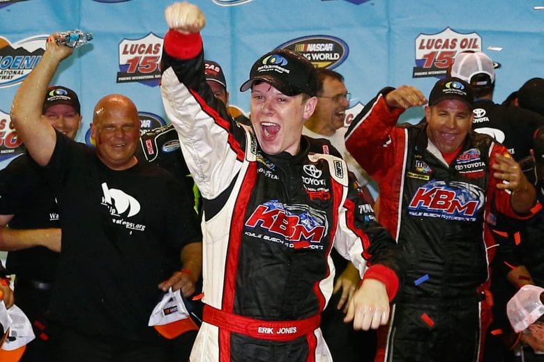AVONDALE, AZ - NOVEMBER 08: Erik Jones, driver of the #51 Wake Up Narcolepsy Awake at the Wheel Toyota, celebrates in victory lane after winning the NASCAR Camping World Truck Series Lucas Oil 150 at Phoenix International Raceway on November 8, 2013 in Avondale, Arizona. The 17 year-old Jones became the youngest ever winner in the NASCAR Camping World Truck Series. (Photo by Tom Pennington/Getty Images) | Getty Images