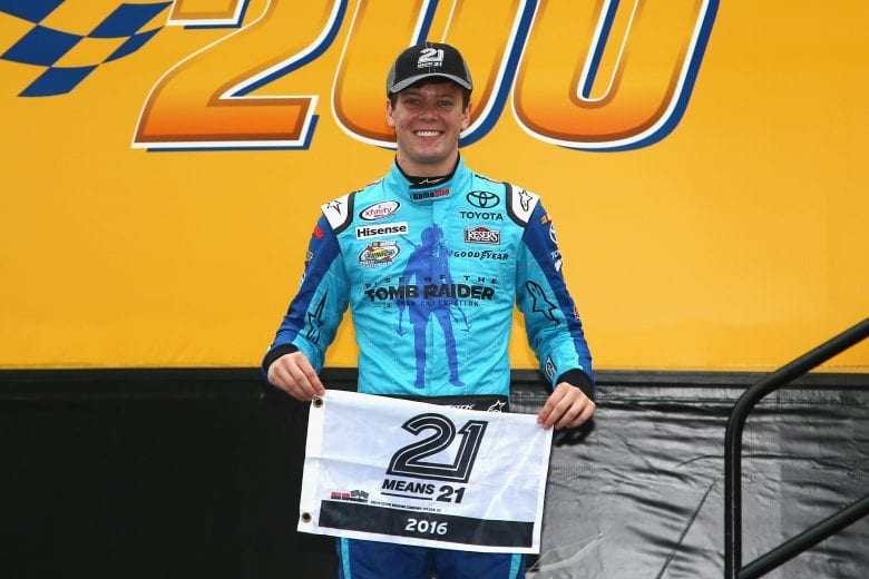 DOVER, DE - OCTOBER 01: Erik Jones, driver of the #20 GameStop/Rise of the Tomb Raider: 20 Year Celebration Toyota, poses with the 21 Means 21 Pole Award after qualifying for pole position for the NASCAR XFINITY Series Drive Sober 200 at Dover International Speedway on October 1, 2016 in Dover, Delaware. (Photo by Sarah Crabill/NASCAR via Getty Images)