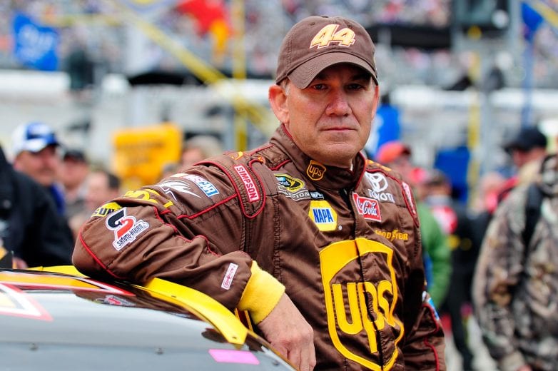BRISTOL, TN - MARCH 16: Dale Jarrett, driver of the #44 UPS Toyota, stands on the grid prior to the start of the NASCAR Sprint Cup Series Food City 500 at the Bristol Motor Speedway on March 16, 2008 in Bristol, Tennessee. The Food City 500 at the Bristol Motor Speedway will be Dale Jarrett last points race. (Photo by Rusty Jarrett/Getty Images for NASCAR) | Getty Images