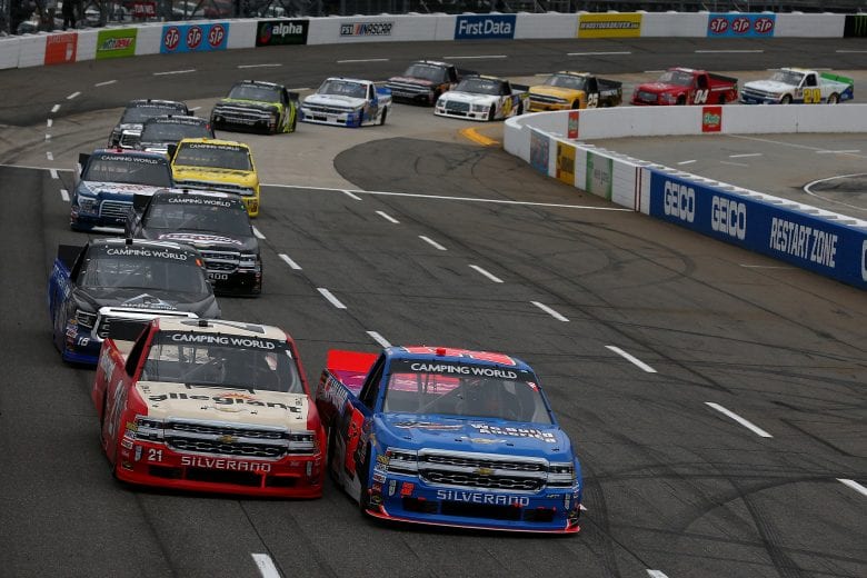 MARTINSVILLE, VA - MARCH 24:  Stewart Friesen, driver of the #52 We Build America Chevrolet, leads Johnny Sauter, driver of the #21 Allegiant Airlines Chevrolet, during the NASCAR Camping World Truck Series Alpha Energy Solutions 250 at Martinsville Speedway on March 24, 2018 in Martinsville, Virginia.  (Photo by Sarah Crabill/Getty Images) | Getty Images