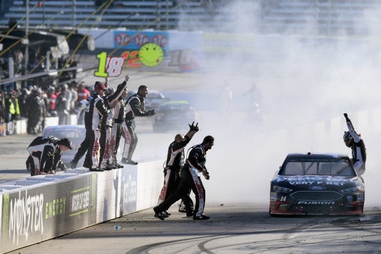 MARTINSVILLE, VA - MARCH 26:  Clint Bowyer, driver of the #14 Haas Automation Demo Day Ford, celebrates winning the weather delayed Monster Energy NASCAR Cup Series STP 500 at Martinsville Speedway on March 26, 2018 in Martinsville, Virginia.  (Photo by Jared C. Tilton/Getty Images) | Getty Images