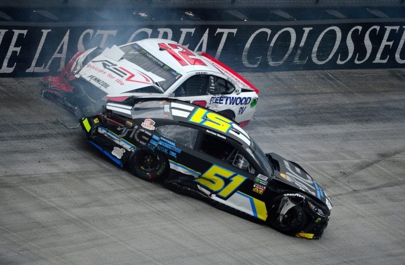 BRISTOL, TN - APRIL 15:  Ryan Blaney, driver of the #12 REV Ford, and Harrison Rhodes, driver of the #51 Industrial Construction Experts Inc. Chevrolet, are involved in an on-track incident during the Monster Energy NASCAR Cup Series Food City 500 at Bristol Motor Speedway on April 15, 2018 in Bristol, Tennessee.  (Photo by Robert Laberge/Getty Images) | Getty Images