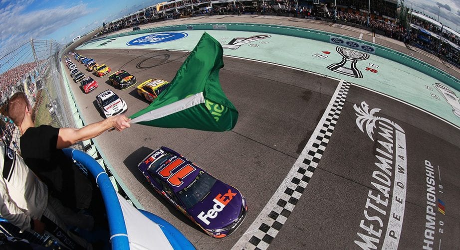 Denny Hamlin leads the field to the green flag at Homestead-Miami Speedway.
