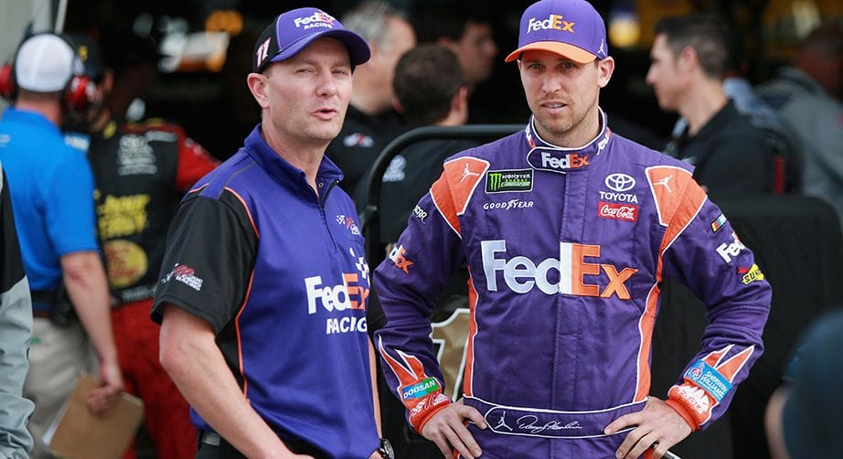 Denny Hamlin and Mike Wheeler chat at Charlotte.