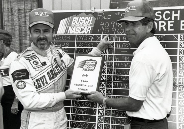 Geoffery Bodine wins his 4th pole at the Champion Spark Plug 400.