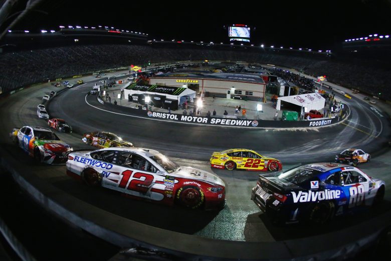 BRISTOL, TN - AUGUST 18:  Alex Bowman, driver of the #88 Valvoline Chevrolet, and Ryan Blaney, driver of the #12 REV Ford, race during the Monster Energy NASCAR Cup Series Bass Pro Shops NRA Night Race at Bristol Motor Speedway on August 18, 2018 in Bristol, Tennessee.  (Photo by Sarah Crabill/Getty Images) | Getty Images