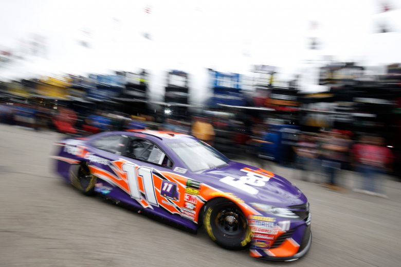 DOVER, DE - OCTOBER 06:  Denny Hamlin drives the #11 FedEx Express Toyota through the garage area during practice for the Monster Energy NASCAR Cup Series Gander Outdoors 400 at Dover International Speedway on October 6, 2018 in Dover, Delaware.  (Photo by Chris Trotman/Getty Images) | Getty Images
