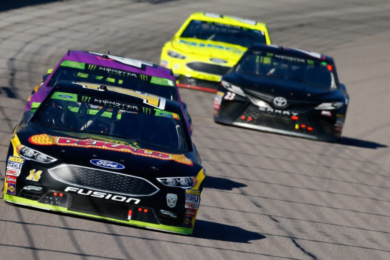 KANSAS CITY, KS - OCTOBER 21:  Clint Bowyer, driver of the #14 Dekalb Ford, leads a pack of cars during the Monster Energy NASCAR Cup Series Hollywood Casino 400 at Kansas Speedway on October 21, 2018 in Kansas City, Kansas.  (Photo by Jonathan Ferrey/Getty Images) | Getty Images
