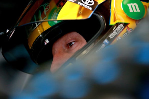HOMESTEAD, FL - NOVEMBER 16:  Kyle Busch, driver of the #18 M&M's Toyota, sits in his car in the garage area during practice for the Monster Energy NASCAR Cup Series Ford EcoBoost 400 at Homestead-Miami Speedway on November 16, 2018 in Homestead, Florida.  (Photo by Sean Gardner/Getty Images) | Getty Images