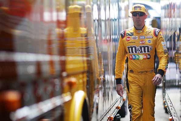 HOMESTEAD, FL - NOVEMBER 17: Kyle Busch, driver of the #18 M&M's Toyota, walks through the garage area during practice for the Monster Energy NASCAR Cup Series Ford EcoBoost 400 at Homestead-Miami Speedway on November 17, 2018 in Homestead, Florida. (Photo by Chris Graythen/Getty Images) | Getty Images