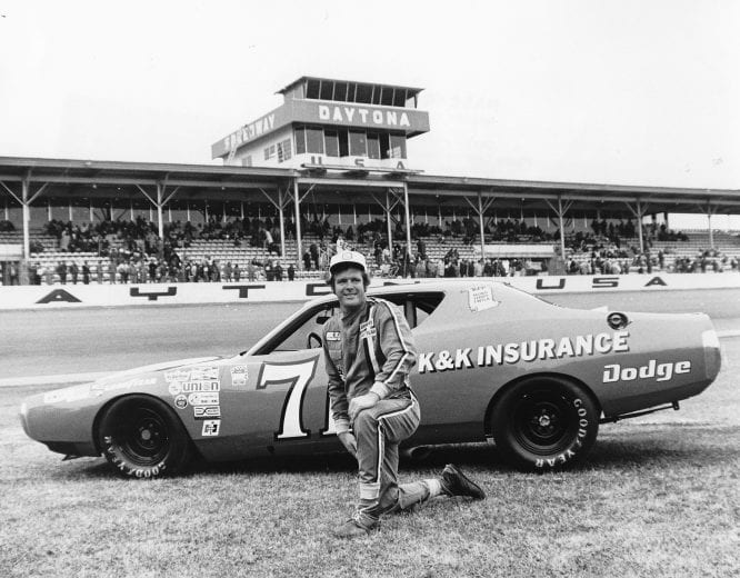 DAYTONA BEACH, FL — February 1973: Buddy Baker with the K&K Insurance Dodge Charger that he placed on the pole position for the Daytona 500 at Daytona International Speedway. Baker finished sixth in the race. (Photo by ISC Images & Archives via Getty Images)