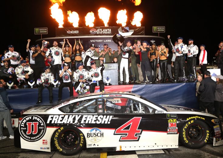 HAMPTON, GA - FEBRUARY 25:  Kevin Harvick, driver of the #4 Jimmy John's Ford, and his team celebrate in Victory Lane after winning the Monster Energy NASCAR Cup Series Folds of Honor QuikTrip 500 at Atlanta Motor Speedway on February 25, 2018 in Hampton, Georgia.  (Photo by Jerry Markland/Getty Images) | Getty Images