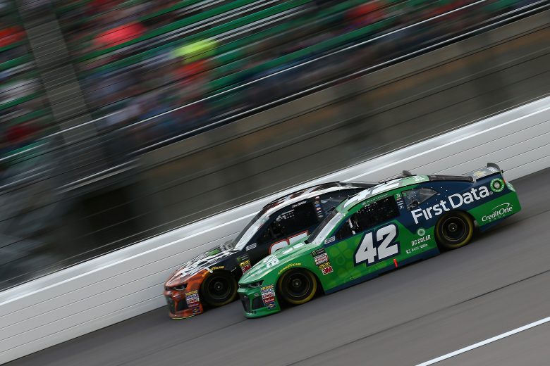 KANSAS CITY, KS - MAY 12:  Kyle Larson, driver of the #42 Clover/First Data Chevrolet, races Chris Buescher, driver of the #37 Breyers 2 in 1 Chevrolet, during the Monster Energy NASCAR Cup Series KC Masterpiece 400 at Kansas Speedway on May 12, 2018 in Kansas City, Kansas.  (Photo by Sarah Crabill/Getty Images) | Getty Images
