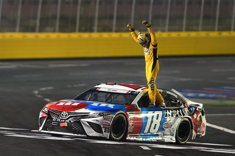 CHARLOTTE, NC - MAY 27:  Kyle Busch, driver of the #18 M&M's Red White & Blue Toyota, celebrates winning the Monster Energy NASCAR Cup Series Coca-Cola 600 at Charlotte Motor Speedway on May 27, 2018 in Charlotte, North Carolina.  (Photo by Jared C. Tilton/Getty Images) | Getty Images