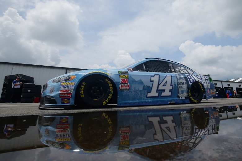 LONG POND, PA - JUNE 01: Clint Bowyer, driver of the #14 Busch Light Ford, drives through the garage area during practice for the Monster Energy NASCAR Cup Series Pocono 400 at Pocono Raceway on June 1, 2018 in Long Pond, Pennsylvania.  (Photo by Chris Trotman/Getty Images) | Getty Images