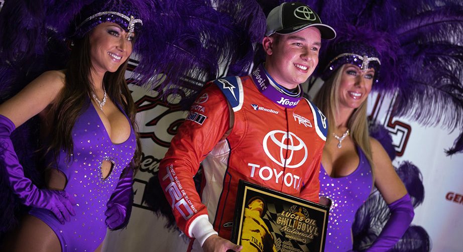 Christopher Bell celebrates winning his preliminary qualifying night at the Chili Bowl.