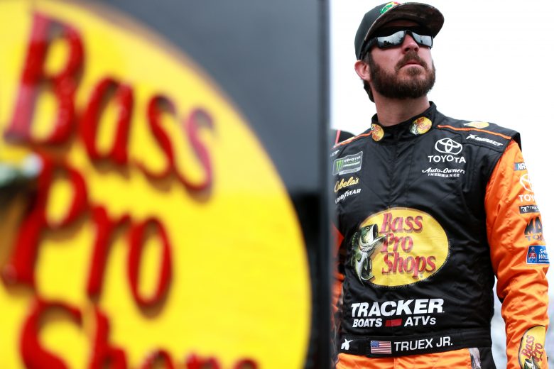 DAYTONA BEACH, FL - FEBRUARY 10: Martin Truex Jr., driver of the #19 Bass Pro Shops Toyota, stands on the grid during qualifying for the Monster Energy NASCAR Cup Series 61st Annual Daytona 500 at Daytona International Speedway on February 10, 2019 in Daytona Beach, Florida. (Photo by Sean Gardner/Getty Images) | Getty Images