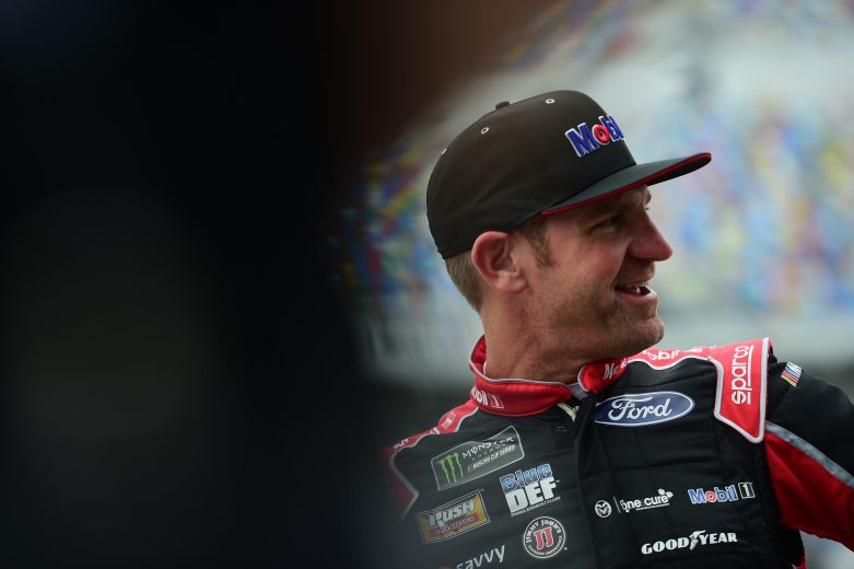 DAYTONA BEACH, FL - FEBRUARY 10:  Clint Bowyer, driver of the #14 Rush Truck Centers/Mobil 1 Ford, stands on the grid during qualifying for the Monster Energy NASCAR Cup Series 61st Annual Daytona 500 at Daytona International Speedway on February 10, 2019 in Daytona Beach, Florida.  (Photo by Jared C. Tilton/Getty Images) | Getty Images