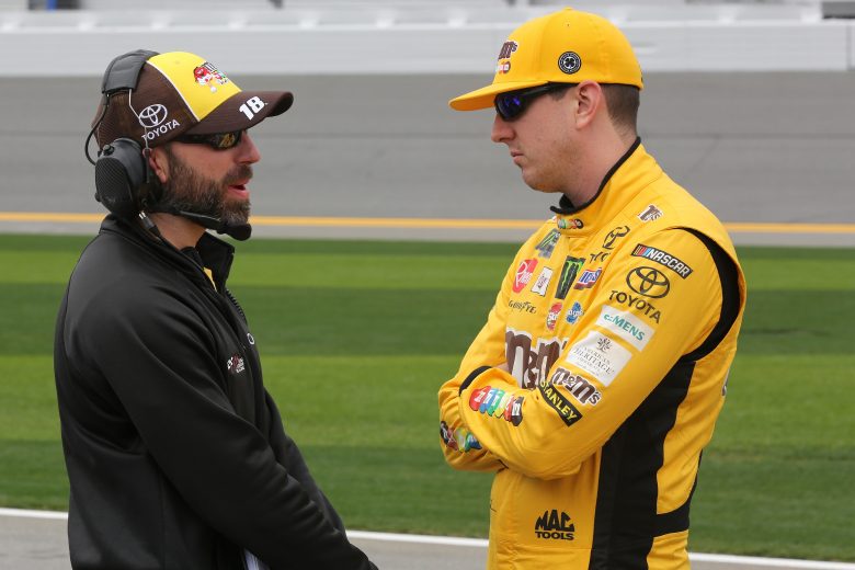 DAYTONA BEACH, FL - FEBRUARY 10: Kyle Busch, driver of the #18 M&M's Chocolate Bar Toyota, talks with crew chief Adam Stevens during qualifying for the Monster Energy NASCAR Cup Series 61st Annual Daytona 500 at Daytona International Speedway on February 10, 2019 in Daytona Beach, Florida. (Photo by Jerry Markland/Getty Images) | Getty Images