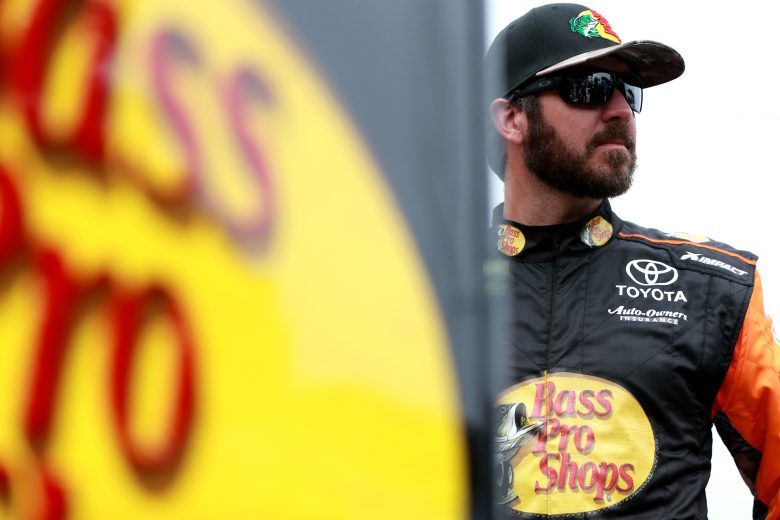 DAYTONA BEACH, FL - FEBRUARY 10: Martin Truex Jr., driver of the #19 Bass Pro Shops Toyota, stands on the grid during qualifying for the Monster Energy NASCAR Cup Series 61st Annual Daytona 500 at Daytona International Speedway on February 10, 2019 in Daytona Beach, Florida. (Photo by Sean Gardner/Getty Images) | Getty Images