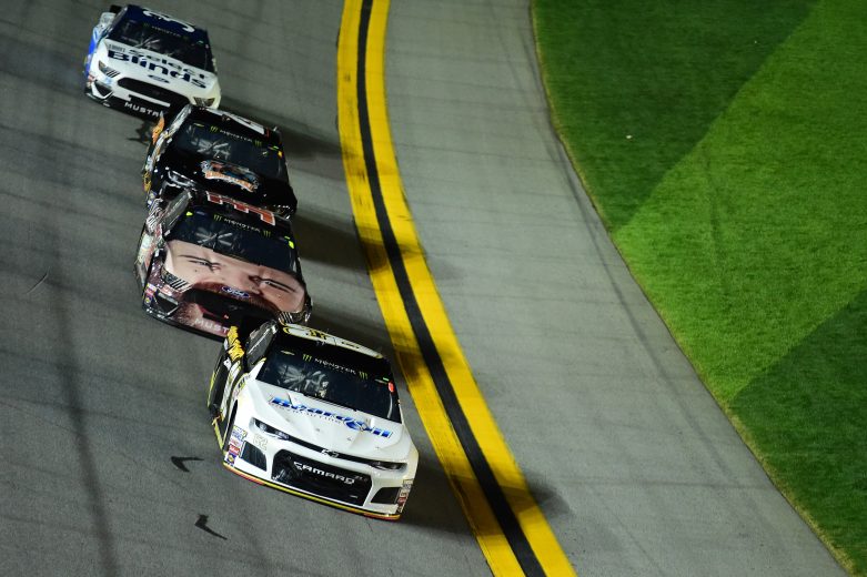 Brendan Gaughan leads a pack of cars at Daytona.
