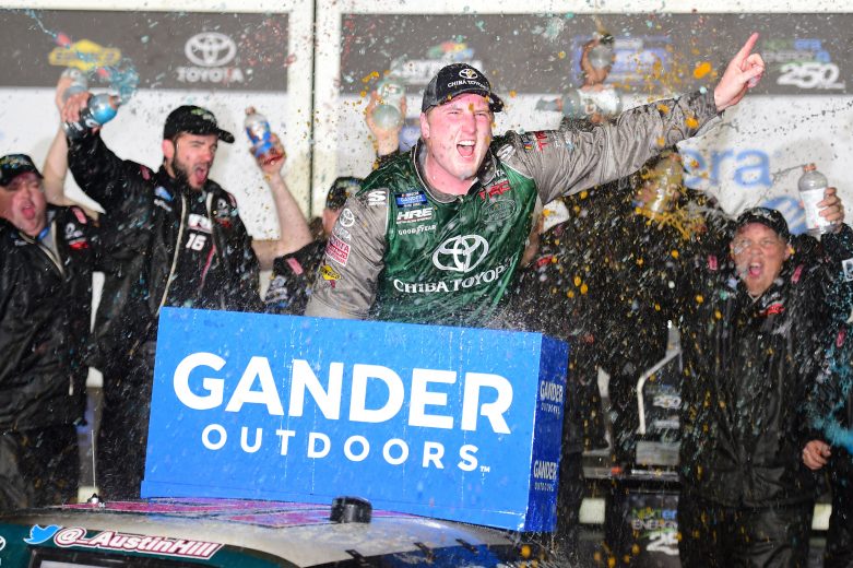 Austin Hill celebrates winning at Daytona in Victory Lane.