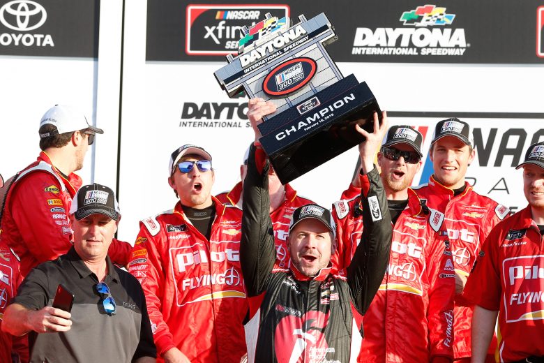 DAYTONA BEACH, FL - FEBRUARY 16: Michael Annett, driver of the #1 Pilot Flying J/American Heart Association Chevrolet, poses with the trophy in Vicotory Lane after winning the NASCAR Xfinity Series NASCAR Racing Experience 300 at Daytona International Speedway on February 16, 2019 in Daytona Beach, Florida. (Photo by Brian Lawdermilk/Getty Images) | Getty Images
