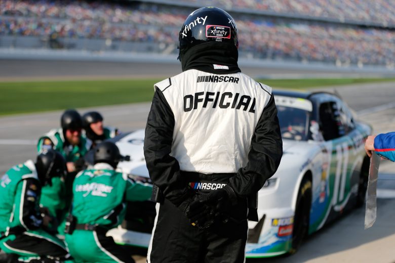 DAYTONA BEACH, FL - FEBRUARY 16: A NASCAR Official watches a pit stop during the NASCAR Xfinity Series NASCAR Racing Experience 300 at Daytona International Speedway on February 16, 2019 in Daytona Beach, Florida. (Photo by Brian Lawdermilk/Getty Images) | Getty Images