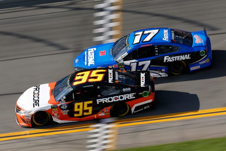 DAYTONA BEACH, FL - FEBRUARY 17: Matt DiBenedetto, driver of the #95 Procore Toyota, races Ricky Stenhouse Jr., driver of the #17 Fastenal Ford, during the Monster Energy NASCAR Cup Series 61st Annual Daytona 500 at Daytona International Speedway on February 17, 2019 in Daytona Beach, Florida. (Photo by Jonathan Ferrey/Getty Images) | Getty Images