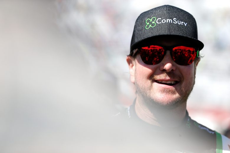 HAMPTON, GA - FEBRUARY 24: Kurt Busch, driver of the #1 ComSurv Chevrolet, stands on the grid before the Monster Energy NASCAR Cup Series Folds of Honor QuikTrip 500 at Atlanta Motor Speedway on February 24, 2019 in Hampton, Georgia. (Photo by Brian Lawdermilk/Getty Images) | Getty Images