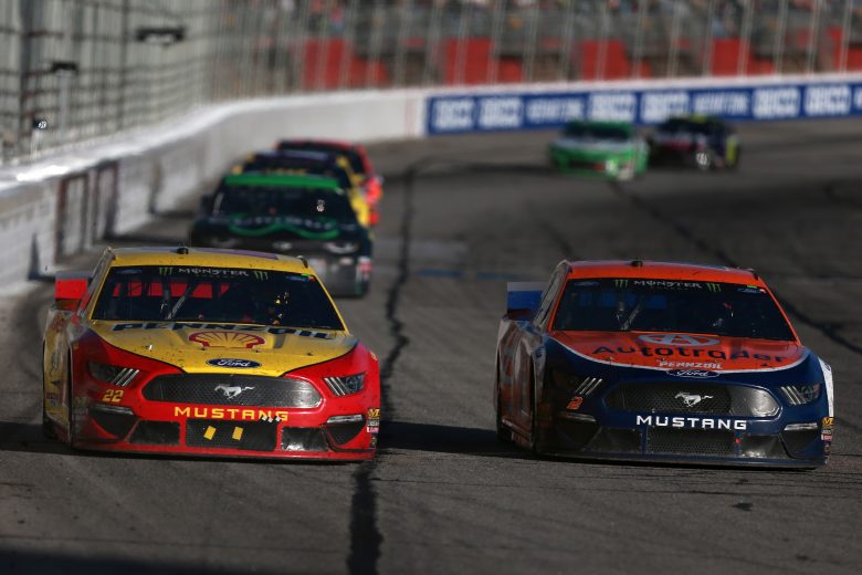 HAMPTON, GA - FEBRUARY 24:  Joey Logano, driver of the #22 Shell Pennzoil Ford, races Brad Keselowski, driver of the #2 Autotrader Ford, during the Monster Energy NASCAR Cup Series Folds of Honor QuikTrip 500 at Atlanta Motor Speedway on February 24, 2019 in Hampton, Georgia.  (Photo by Sean Gardner/Getty Images) | Getty Images