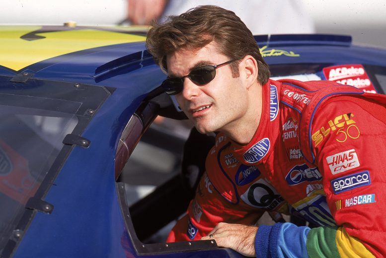 21 Nov 1999: Jeff Gordon reaches into his car during the NAPA 500, part of the NASCAR Winston Cup Series, at the Atlanta Motor Speedway in Hampton, Georgia. Mandatory Credit: David Taylor /Allsport