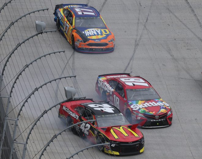 BRISTOL, TN - APRIL 16: Kyle Larson, driver of the #42 McDonald's Chevrolet, and Kyle Busch, driver of the #18 Skittles Toyota, make contact during the rain delayed Monster Energy NASCAR Cup Series Food City 500 at Bristol Motor Speedway on April 16, 2018 in Bristol, Tennessee. (Photo by Jerry Markland/Getty Images) | Getty Images