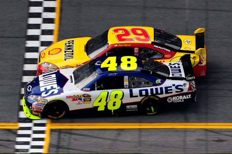 DAYTONA BEACH, FL - FEBRUARY 11: Jimmie Johnson, driver of the #48 Lowe's Chevrolet, crosses the finish line ahead of Kevin Harvick, driver of the #29 Shell/Pennzoil Chevrolet, to win first NASCAR Sprint Cup Series Gatorade Duel at Daytona International Speedway on February 11, 2010 in Daytona Beach, Florida. (Photo by Sam Greenwood/Getty Images for NASCAR) | Getty Images