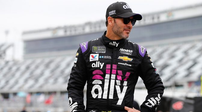 Jimmie Johnson wins rain-shortened Advance Auto Parts Clash