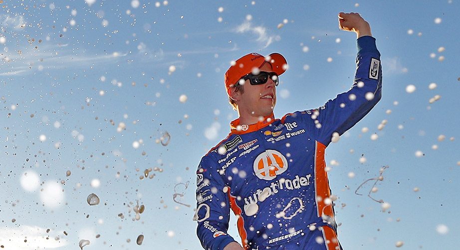 Brad Keselowski celebrates winning at Atlanta.