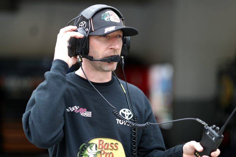 Martin Truex Jr.'s crew chief, Cole Pearn, looks on in the garage.