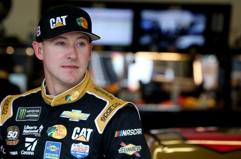 Daniel Hemric looks on in the garage at Daytona.