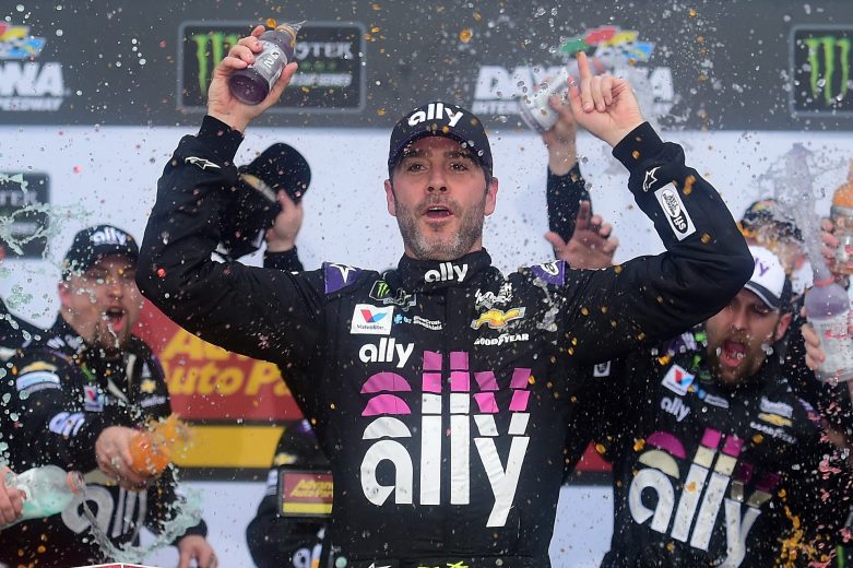 Jimmie Johnson celebrates winning the 2019 Advance Auto Parts Clash at Daytona.