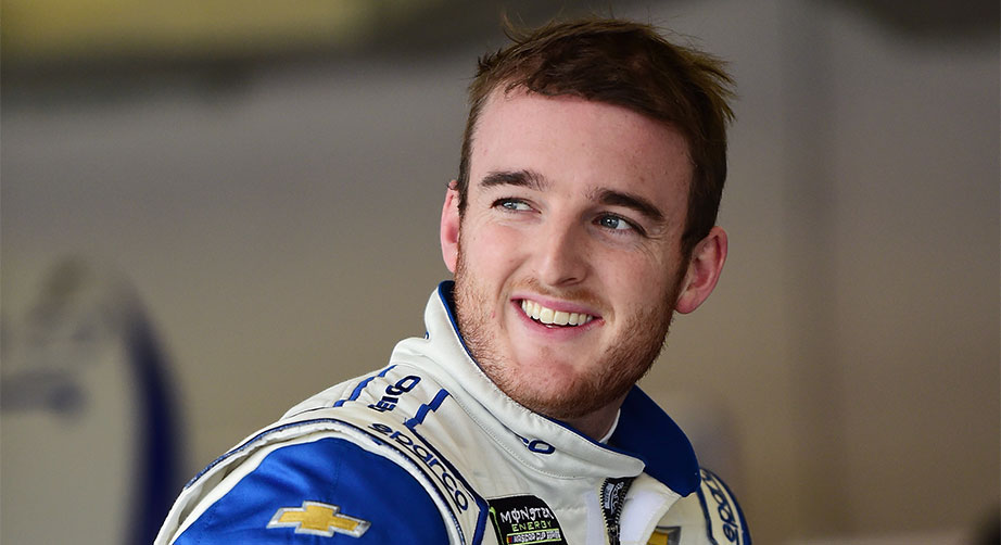 Ty Dillon smiles in the garage