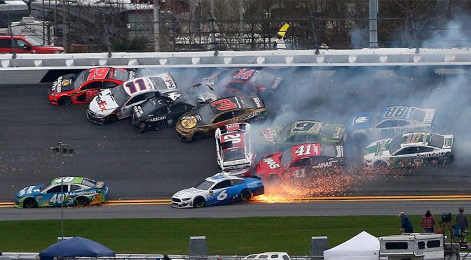 Menard, Johnson set off massive wreck in Clash battling for the lead