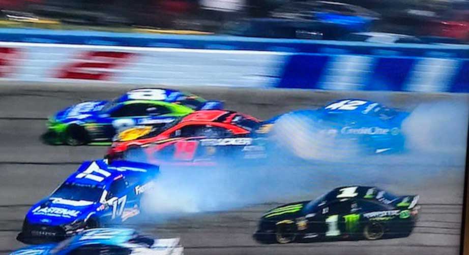 Kurt Busch avoids Ricky Stenhouse Jr.'s spin at Auto Club Speedway.