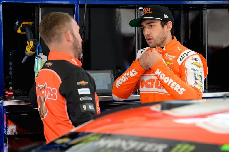 LAS VEGAS, NV - MARCH 02: Chase Elliott, driver of the #9 Hooters Chevrolet, talks to a crew member during practice for the Monster Energy NASCAR Cup Series Pennzoil 400 at Las Vegas Motor Speedway on March 2, 2019 in Las Vegas, Nevada. (Photo by Robert Laberge/Getty Images) | Getty Images