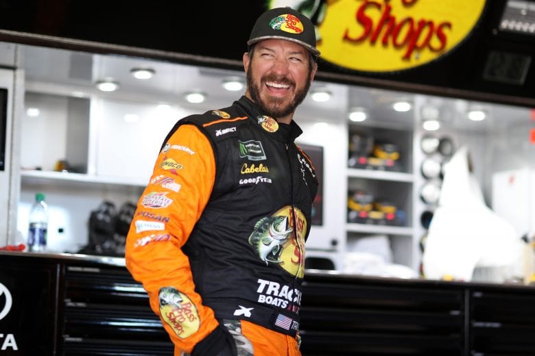 FONTANA, CA - MARCH 16:  Martin Truex Jr, driver of the #19 Bass Pro Shops Toyota, stands in the garage area during practice for the Monster Energy NASCAR Cup Series Auto Club 400 at Auto Club Speedway on March 16, 2019 in Fontana, California.  (Photo by Chris Graythen/Getty Images) | Getty Images